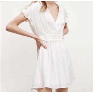 Zara V Neck Side Tie Ruffle Mini Dress White Medium. Ivory. Split Back